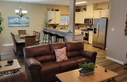 Corpus Christi House | Bottom Level Canal Water Front Home with Spacious Deck, Boat Dock, and Parking!