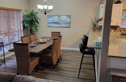 Corpus Christi House | Bottom Level Canal Water Front Home with Spacious Deck, Boat Dock, and Parking!