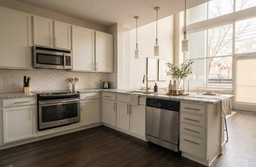 West End Apartment | Boulevard Stays Midtown 30ft Ceilings 1BR 01