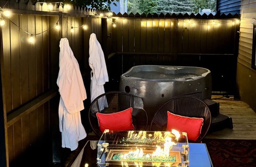 Fayetteville Condo | Boutique Studio Retreat* Hot Tub+Fire Table *Private Deck!