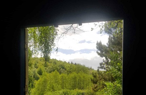 Belle-Isle-en-Terre House | Bow Top Wagon on forest edge