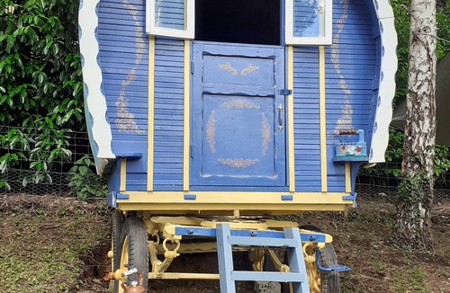 Belle-Isle-en-Terre House | Bow Top Wagon on forest edge