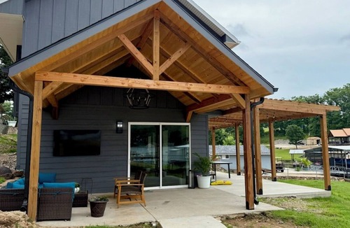 Sunrise Beach House | Brand new luxurious 3-bedroom home w/huge dock in Captain Ron's cove