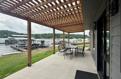 Sunrise Beach House | Brand new luxurious 3-bedroom home w/huge dock in Captain Ron's cove