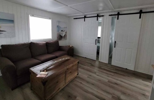Wainfleet Cottage | Brand new newly remodeled cottage steps across from the lake