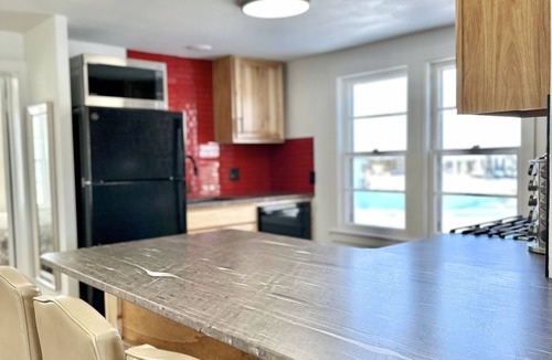 Oskaloosa Condo | Brand New Stylish Condo near Trails & Downtown