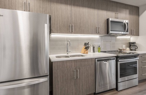 Southwest Calgary Apartment | Brand New Upscale King Bed/Workspace/Free Parking