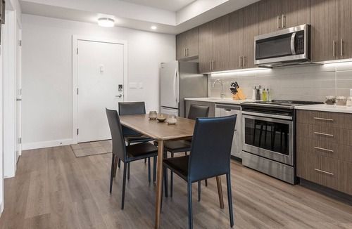 Southwest Calgary Apartment | Brand New Upscale King Bed/Workspace/Free Parking
