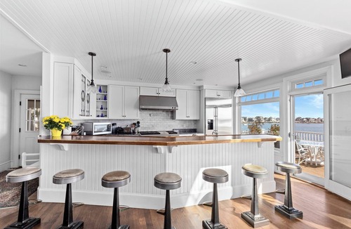 Scituate House | Breathtaking harbor views from spacious beachfront home.