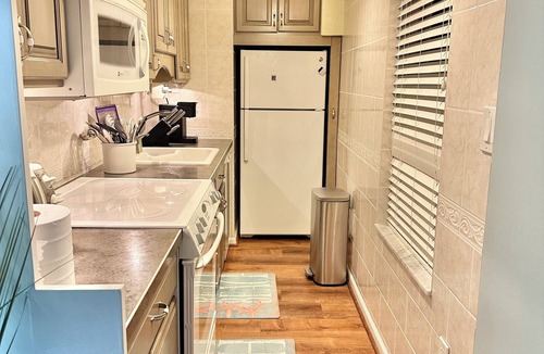 Caine Woods Condo | Breathtaking Ocean view, few steps to the beach!