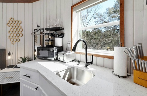 Dripping Springs Cabin | Breathtaking Treehouse Yurt! King Bed and Spa!
