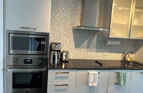 Central Waterfront Condo | Breathtaking view, as well as modern, clean & well-appointed apartment n nn