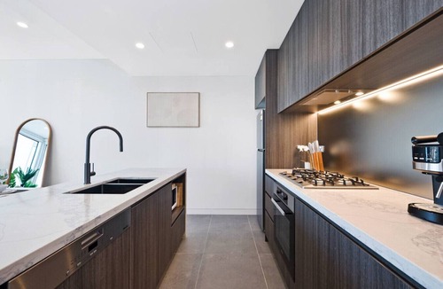 Lidcombe Apartment | Breathtaking Views! Modern 2BR: Pool, Parking, Gym