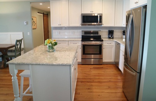 Suttons Bay Cottage | Breathtaking waterfront, 3 bed,2 bath waterfront cottage w SUP’s 3 kayak & bikes