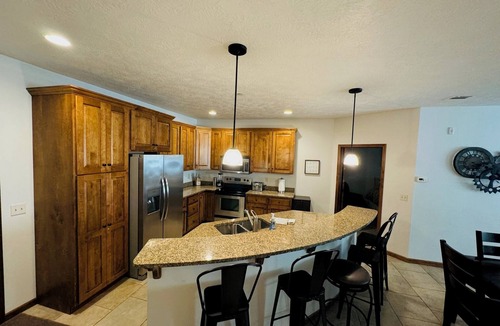 Arnolds Park Condo | Bridges Bay spacious, well-stocked, kid-friendly home. 6 Pool Passes. Sleeps 10.