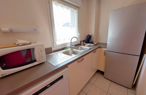 Mayenne Apartment | Bright 2-Bedroom Apartment with Balcony, Garage & Baby Equipment near Mayenne's Attractions