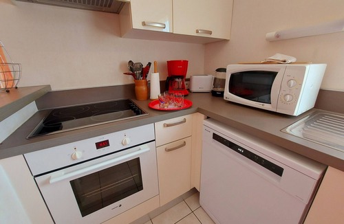 Mayenne Apartment | Bright 2-Bedroom Apartment with Balcony, Garage & Baby Equipment near Mayenne's Attractions