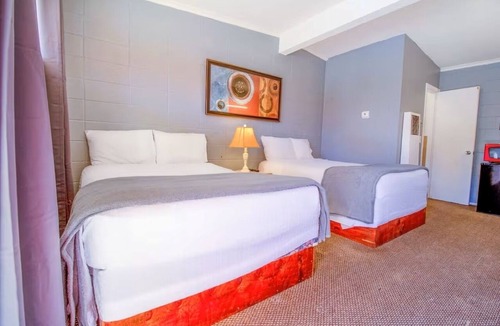 Wheeler Hotel | Bright 2-Queen Stay Close to Museum & City Park Trails + Free Parking