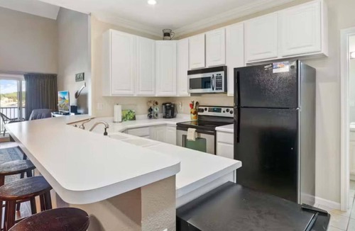 Sunrise Beach Condo | Bright 4BR Condo - Lake View - Water Front pool