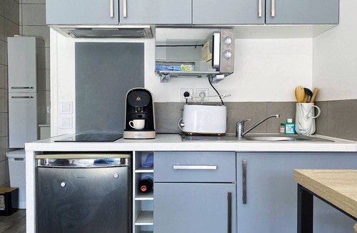 Sant-Vicens Apartment | Bright, air-conditioned studio near shops and bus stops. Garden and parking