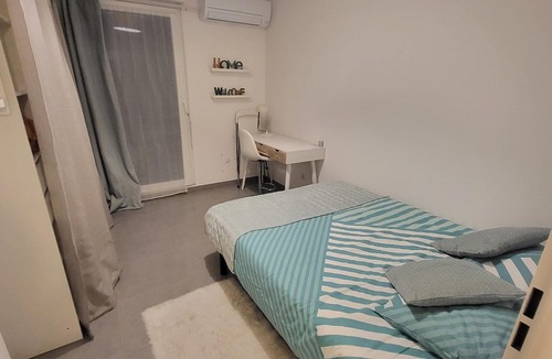 Saint-Jean-de-Vedas Apartment | Bright, air-conditioned apartment with double terrace and parking.