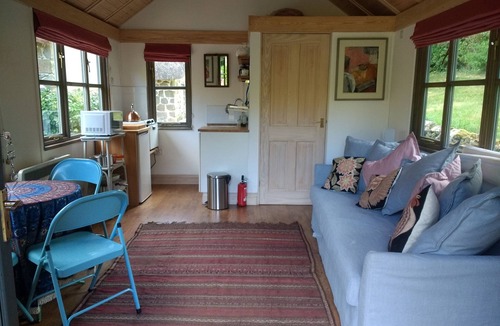 Alton Barnes Cabin | Bright and Airy Garden Room.