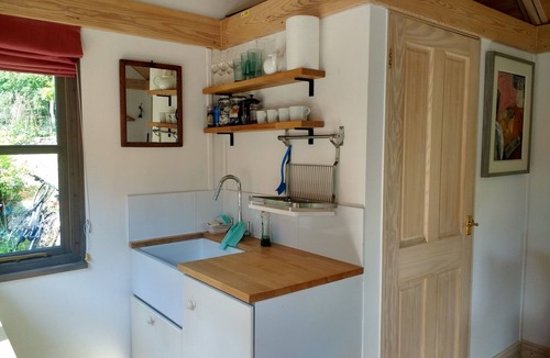 Alton Barnes Cabin | Bright and Airy Garden Room.