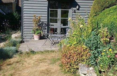 Alton Barnes Cabin | Bright and Airy Garden Room.