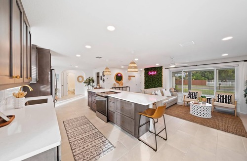 Venetian Way House | Bright and Beachy Pool Home