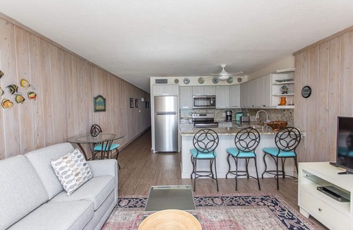 Garden City Condo | BRIGHT AND CHEERY TWO BEDROOM OCEAN FRONT CONDO STEPS AWAY FROM THE OCEAN!