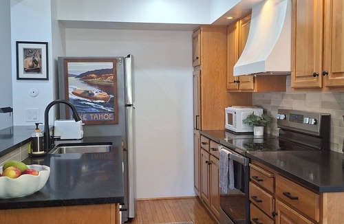 Kings Beach House | Bright and cozy end unit condo in quiet complex. Pool, courts and near Beach.