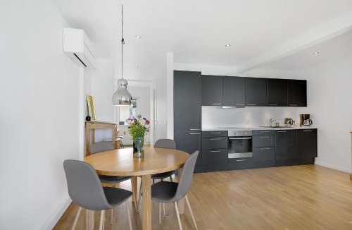 Syddjurs Kommune House | Bright And Inviting Holiday Apartment By Hotel Ebeltoft Strand In First Row With Full Views Of Ebeltoft Bay