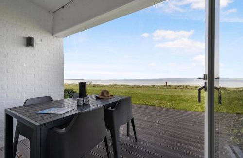Syddjurs Kommune House | Bright And Inviting Holiday Apartment By Hotel Ebeltoft Strand In First Row With Full Views Of Ebeltoft Bay