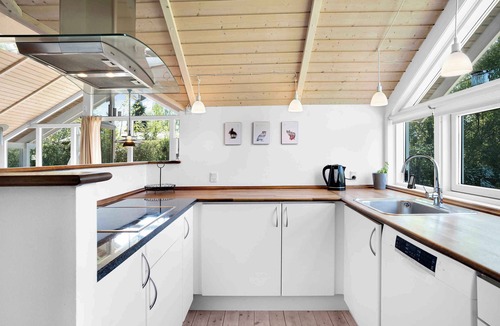 Tikob House | Bright and inviting summer house in North Zealand