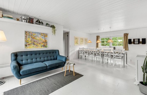 Øby House | Bright and welcoming pool house in green surroundings.