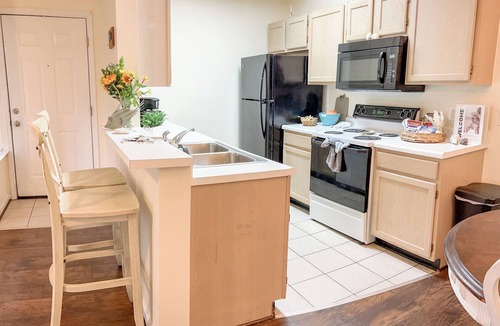 Garden City Condo | Bright & Beachy 2bd/2ba 3rd floor condo with pool. 5 min drive to the beach
