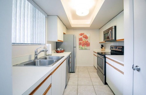 Bonita Bay Condo | Bright & beautiful with lake and golf course views!
