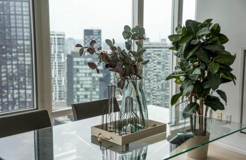 Richmond Hill Apartment | Bright bedroom with private bathroom