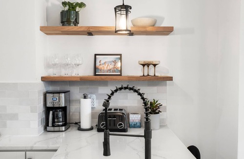 Highland Park Condo | Bright Brownstone w Terrace+View