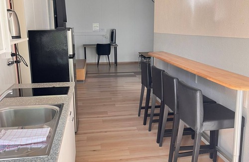 Uster District Apartment | Bright, comfy, industrial looking