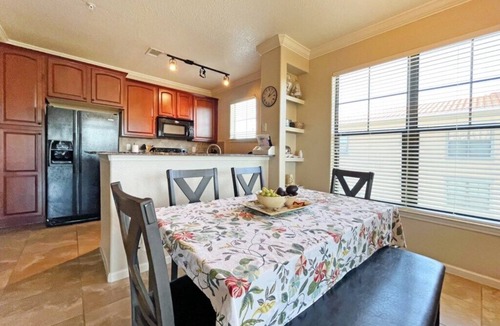 Wellington Condo | Bright condo with south facing balcony overlooking pond