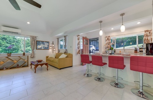 Pauwela Apartment | Bright Haiku Studio: Patio + Rainforest View