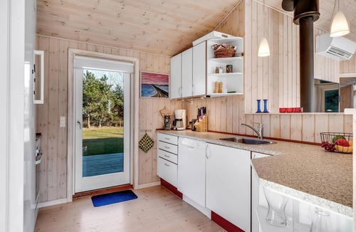 Fjerritslev House | Bright holiday home with electric charger, terrace and wood-burning stove