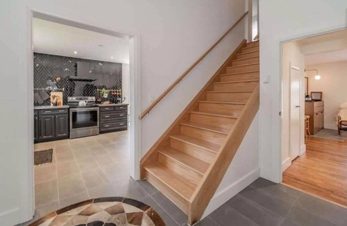 Lagoon City Cottage | Bright Modern Waterfront Cottage w/hot tub - 5 min from the beach!