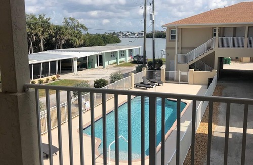 Englewood Apartment | Bright & New Condo Steps Away from Beach and Bay
