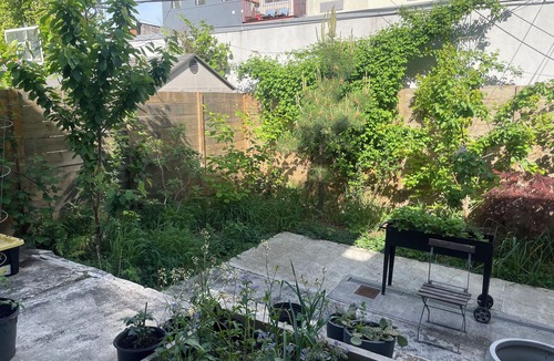 Bushwick House | Bright & Spacious Garden Apartment with workspace in Vibrant Bushwick + Parking!