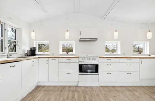 Holloselund House | Bright summer house with pool in Tisvildeleje