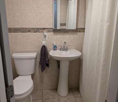 St. Elizabeth's Apartment | Brighton Apartment Sleeps 3 - Steps to Bus Line