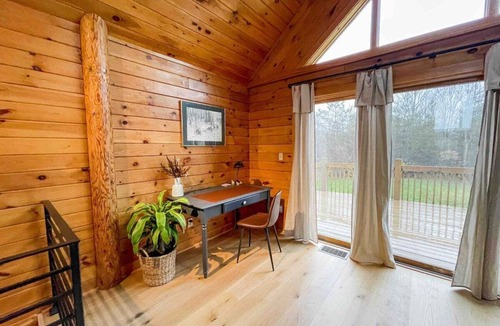 Wales Center House | Bring family and friends to this beautiful, spacious, open plan log home.