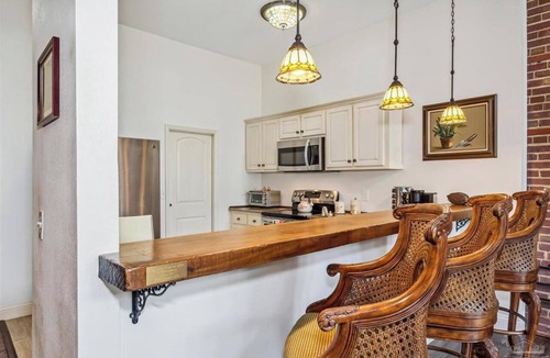 Warrington House | Bring the pup & boat! Historic 2 bedroom, 2.5 bath waterfront town-home w/dock.